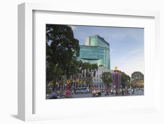 Traffic Passing Diamond Plaza, Ho Chi Minh City, Vietnam, Indochina, Southeast Asia, Asia-Ian Trower-Framed Photographic Print