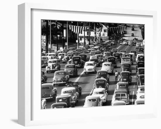 Traffic Traveling on Figueroa and Sunset Street-Loomis Dean-Framed Photographic Print