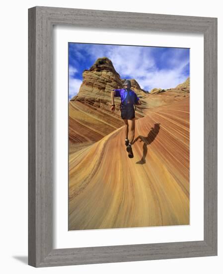 Trail Runner on Sandstone, Coyote Buttes, Utah, USA-Chuck Haney-Framed Photographic Print