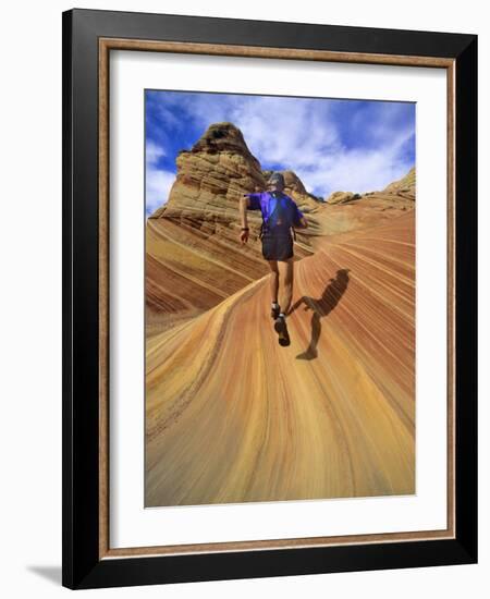 Trail Runner on Sandstone, Coyote Buttes, Utah, USA-Chuck Haney-Framed Photographic Print