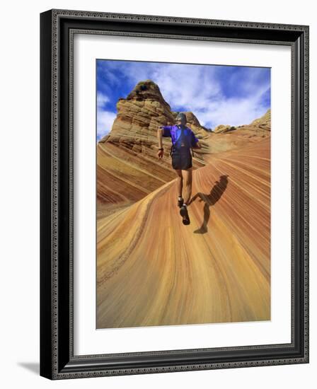 Trail Runner on Sandstone, Coyote Buttes, Utah, USA-Chuck Haney-Framed Photographic Print