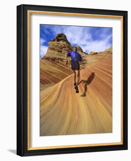 Trail Runner on Sandstone, Coyote Buttes, Utah, USA-Chuck Haney-Framed Photographic Print