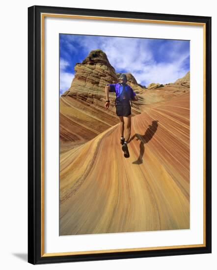 Trail Runner on Sandstone, Coyote Buttes, Utah, USA-Chuck Haney-Framed Photographic Print