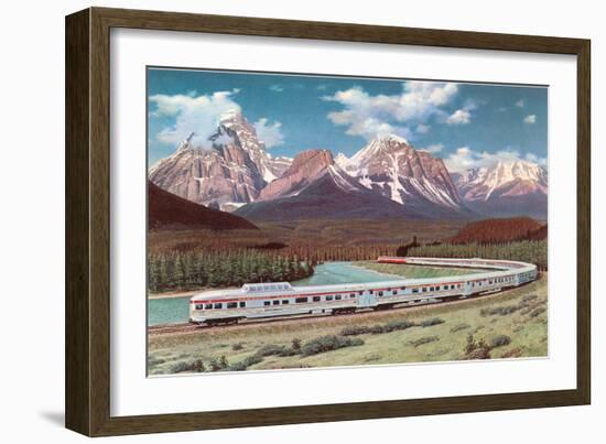 Train Passing through Rocky Mountains-null-Framed Art Print