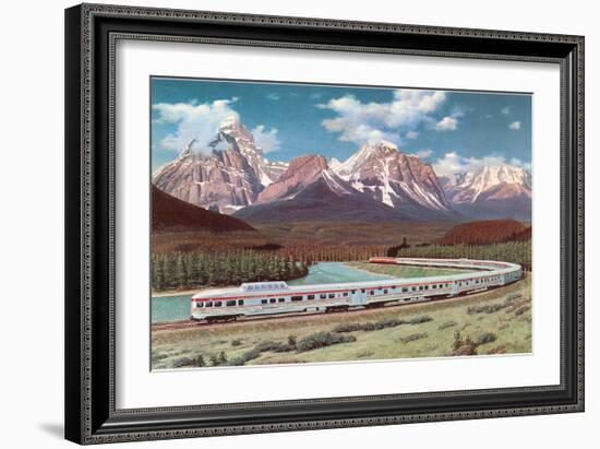 Train Passing through Rocky Mountains-null-Framed Art Print