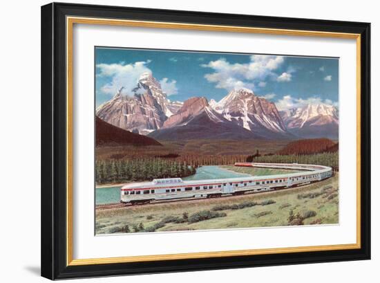 Train Passing through Rocky Mountains-null-Framed Art Print