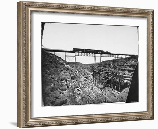 Train Traveling over Santa Fe Railroad Bridge, Which is Built over Canyon Diablo-null-Framed Premium Photographic Print