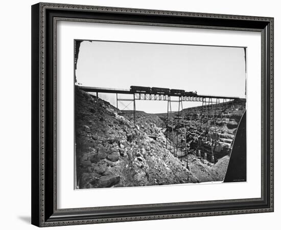 Train Traveling over Santa Fe Railroad Bridge, Which is Built over Canyon Diablo-null-Framed Premium Photographic Print