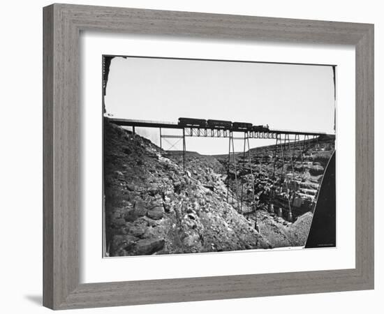 Train Traveling over Santa Fe Railroad Bridge, Which is Built over Canyon Diablo-null-Framed Photographic Print