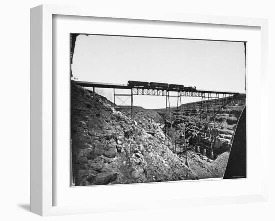 Train Traveling over Santa Fe Railroad Bridge, Which is Built over Canyon Diablo-null-Framed Photographic Print