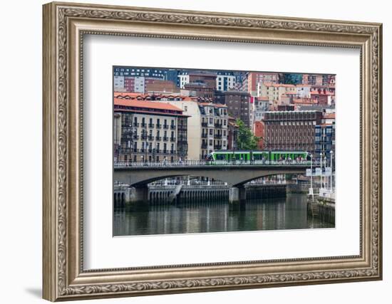 Tram Crossing the River Nervion in Bilbao, Biscay (Vizcaya), Basque Country (Euskadi)-Martin Child-Framed Photographic Print