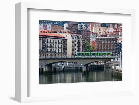 Tram Crossing the River Nervion in Bilbao, Biscay (Vizcaya), Basque Country (Euskadi)-Martin Child-Framed Photographic Print