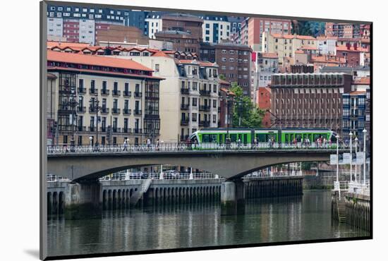 Tram Crossing the River Nervion in Bilbao, Biscay (Vizcaya), Basque Country (Euskadi)-Martin Child-Mounted Photographic Print