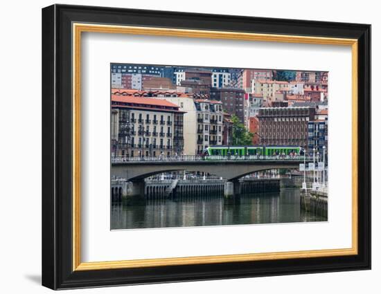 Tram Crossing the River Nervion in Bilbao, Biscay (Vizcaya), Basque Country (Euskadi)-Martin Child-Framed Photographic Print