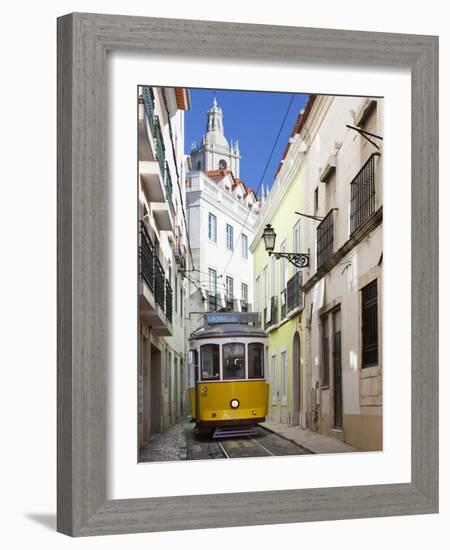 Tram (Electricos) Along Rua Das Escolas Gerais with Tower of Sao Vicente de Fora, Lisbon, Portugal-Stuart Black-Framed Photographic Print