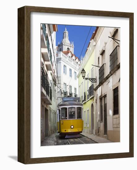 Tram (Electricos) Along Rua Das Escolas Gerais with Tower of Sao Vicente de Fora, Lisbon, Portugal-Stuart Black-Framed Photographic Print