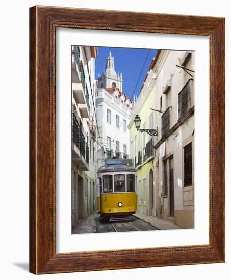 Tram (Electricos) Along Rua Das Escolas Gerais with Tower of Sao Vicente de Fora, Lisbon, Portugal-Stuart Black-Framed Photographic Print