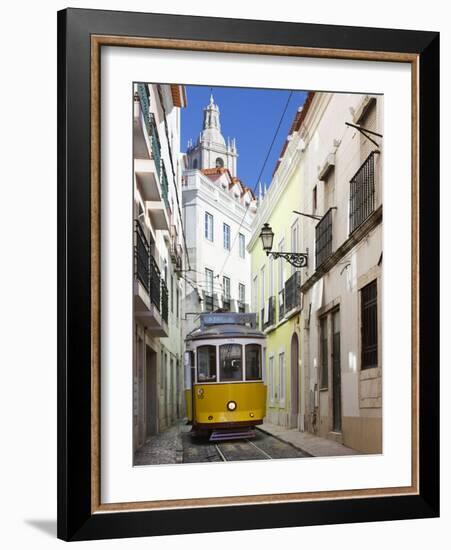 Tram (Electricos) Along Rua Das Escolas Gerais with Tower of Sao Vicente de Fora, Lisbon, Portugal-Stuart Black-Framed Photographic Print