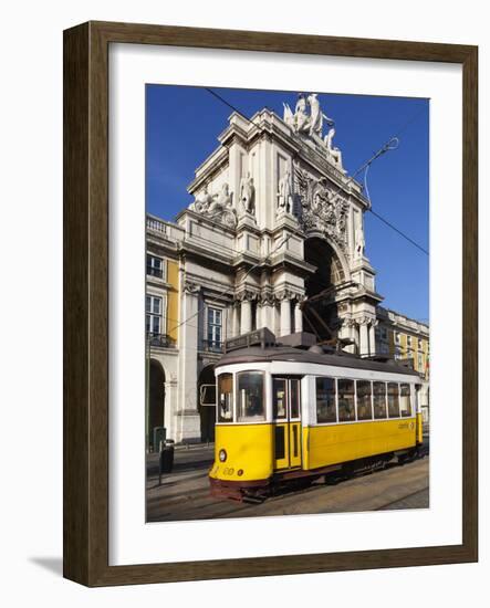 Tram (Electricos) Below the Arco Da Rua Augusta in Praca Do Comercio, Baixa, Lisbon, Portugal-Stuart Black-Framed Photographic Print