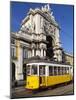 Tram (Electricos) Below the Arco Da Rua Augusta in Praca Do Comercio, Baixa, Lisbon, Portugal-Stuart Black-Mounted Photographic Print