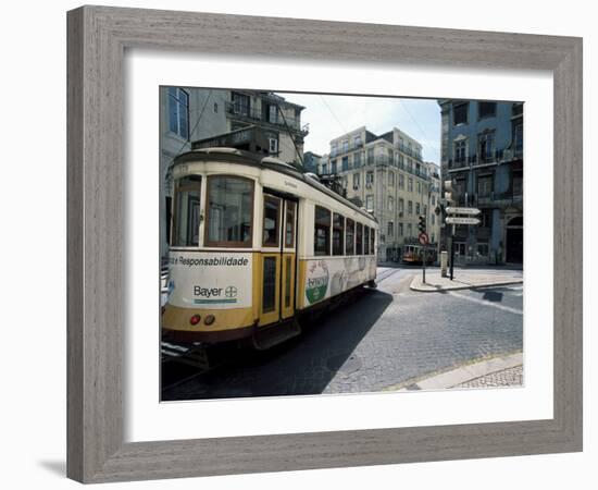 Tram in the Baixa District, Lisbon, Portugal-Neale Clarke-Framed Photographic Print