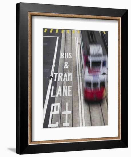 Tram Passing Along Des Voeux Road Central, Central, Hong Kong, China-Ian Trower-Framed Photographic Print