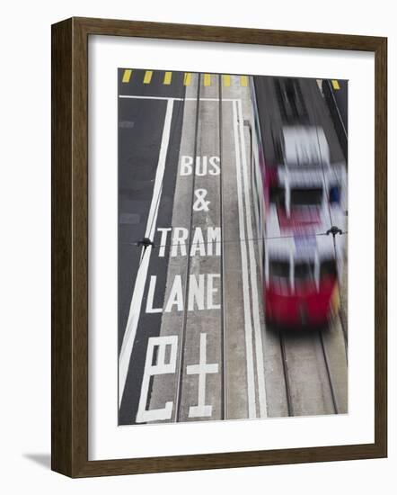 Tram Passing Along Des Voeux Road Central, Central, Hong Kong, China-Ian Trower-Framed Photographic Print