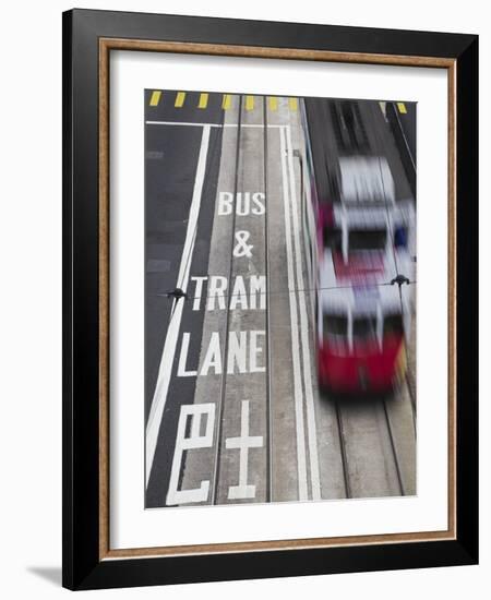 Tram Passing Along Des Voeux Road Central, Central, Hong Kong, China-Ian Trower-Framed Photographic Print