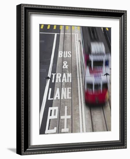 Tram Passing Along Des Voeux Road Central, Central, Hong Kong, China-Ian Trower-Framed Photographic Print