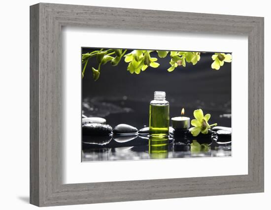 Tranquil Spa Scene - Massage Oil and Candle on Black Stones with Green Orchid-crystalfoto-Framed Photographic Print