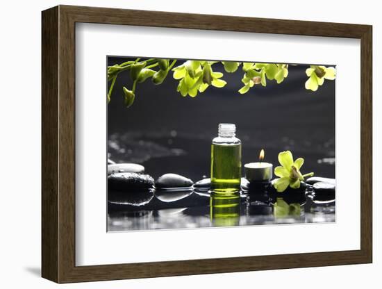 Tranquil Spa Scene - Massage Oil and Candle on Black Stones with Green Orchid-crystalfoto-Framed Photographic Print