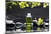 Tranquil Spa Scene - Massage Oil and Candle on Black Stones with Green Orchid-crystalfoto-Mounted Photographic Print