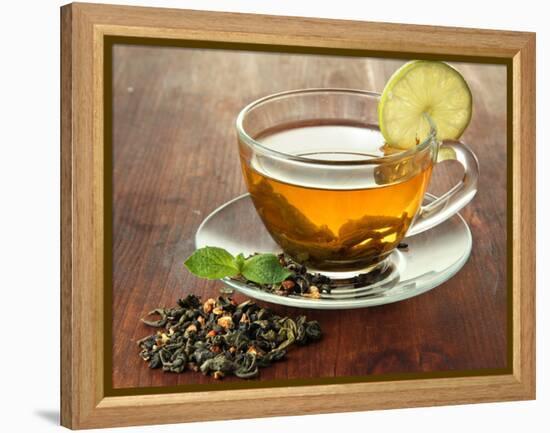 Transparent Cup of Green Tea with Lime on Wooden Background-Yastremska-Framed Premier Image Canvas