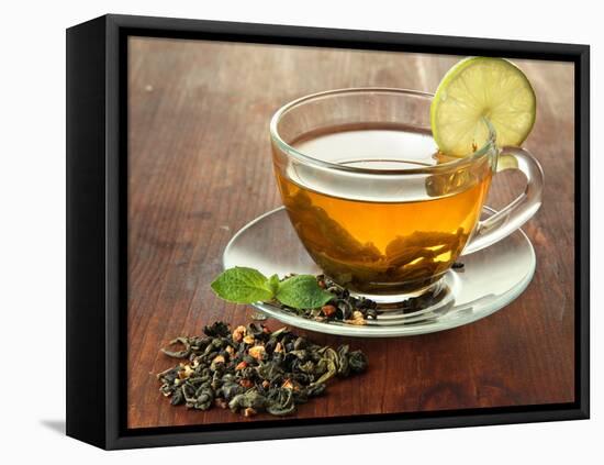 Transparent Cup of Green Tea with Lime on Wooden Background-Yastremska-Framed Premier Image Canvas