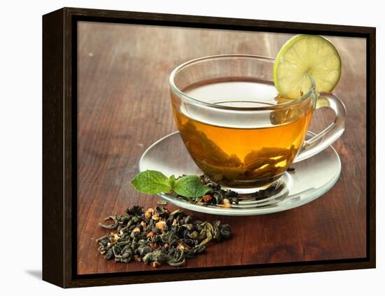 Transparent Cup of Green Tea with Lime on Wooden Background-Yastremska-Framed Premier Image Canvas