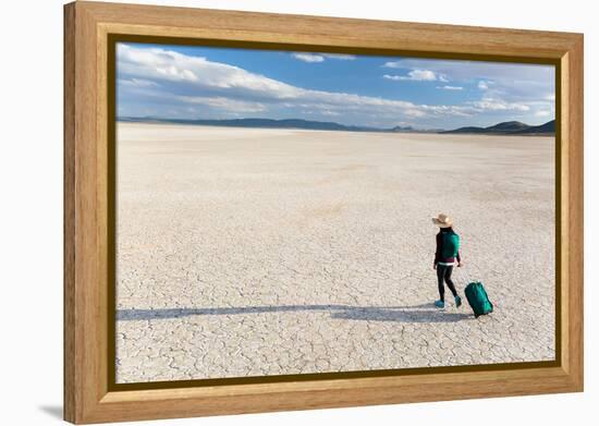 Traveler Rolls A Carry-On Suitcase, The Playa In The Alvord Desert Of SE Oregon-Ben Herndon-Framed Premier Image Canvas