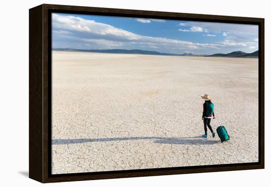 Traveler Rolls A Carry-On Suitcase, The Playa In The Alvord Desert Of SE Oregon-Ben Herndon-Framed Premier Image Canvas