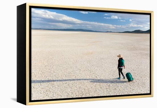 Traveler Rolls A Carry-On Suitcase, The Playa In The Alvord Desert Of SE Oregon-Ben Herndon-Framed Premier Image Canvas