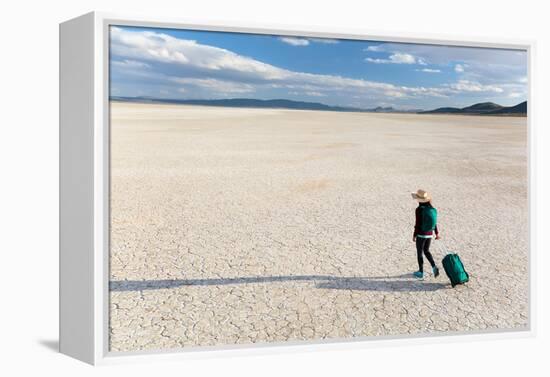 Traveler Rolls A Carry-On Suitcase, The Playa In The Alvord Desert Of SE Oregon-Ben Herndon-Framed Premier Image Canvas