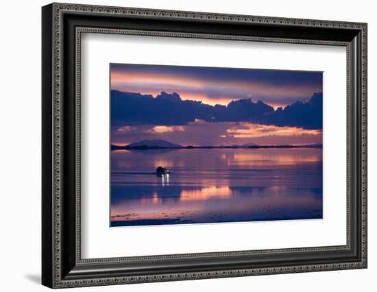 Travelers Drive their Suv across a the Salar De Uyuni, a Flooded Salt Flat, in Bolivia-Sergio Ballivian-Framed Photographic Print