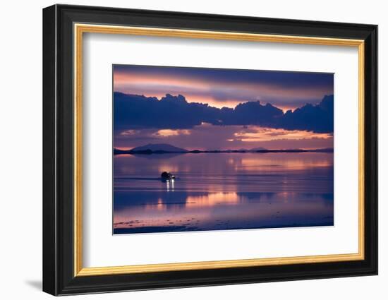 Travelers Drive their Suv across a the Salar De Uyuni, a Flooded Salt Flat, in Bolivia-Sergio Ballivian-Framed Photographic Print