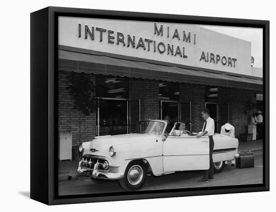 Travelers in a Chevy Bel Air Convertible at the Miami International Airport, 1954 August 22-null-Framed Premier Image Canvas