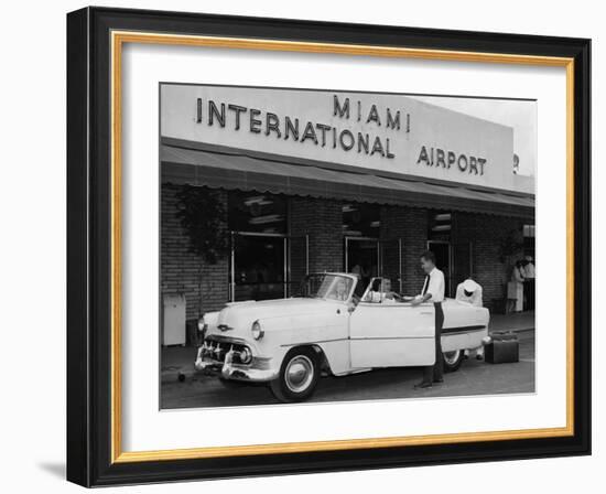 Travelers in a Chevy Bel Air Convertible at the Miami International Airport, 1954 August 22-null-Framed Photographic Print