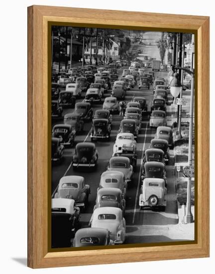 Traveling Through Rush Hour Traffic in Downtown Los Angeles-Loomis Dean-Framed Premier Image Canvas