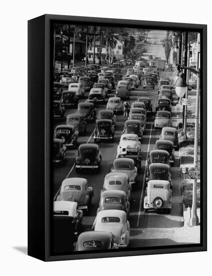 Traveling Through Rush Hour Traffic in Downtown Los Angeles-Loomis Dean-Framed Premier Image Canvas