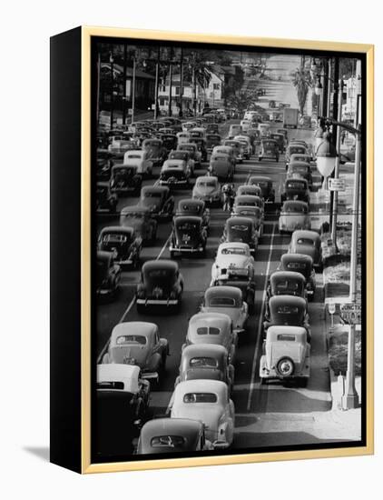 Traveling Through Rush Hour Traffic in Downtown Los Angeles-Loomis Dean-Framed Premier Image Canvas