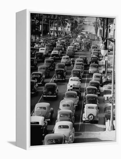 Traveling Through Rush Hour Traffic in Downtown Los Angeles-Loomis Dean-Framed Premier Image Canvas