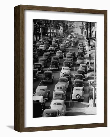 Traveling Through Rush Hour Traffic in Downtown Los Angeles-Loomis Dean-Framed Photographic Print