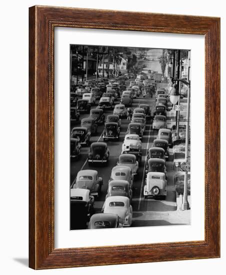 Traveling Through Rush Hour Traffic in Downtown Los Angeles-Loomis Dean-Framed Photographic Print