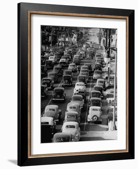 Traveling Through Rush Hour Traffic in Downtown Los Angeles-Loomis Dean-Framed Photographic Print